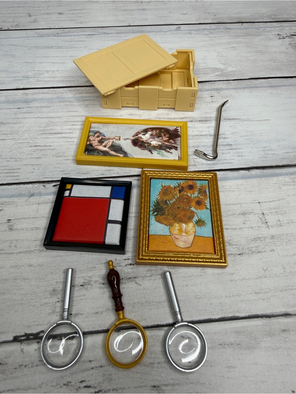 Bundle of three Mini Brands Masterpiece paintings, accessories